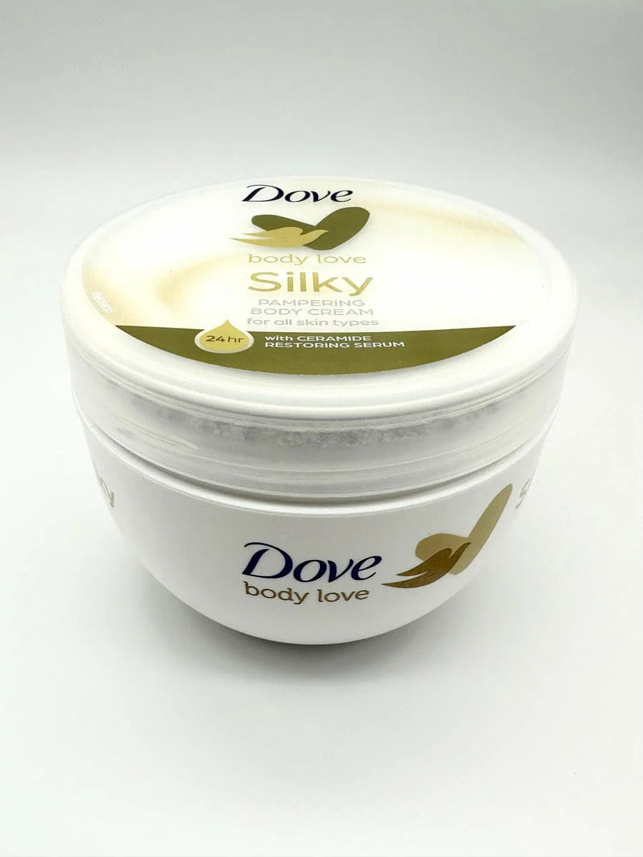 DOVE Silky Body Cream 300ml front view

Cream texture on hand or skin

DOVE body cream in moisturizing routine

Glowing skin results after using Dove body cream